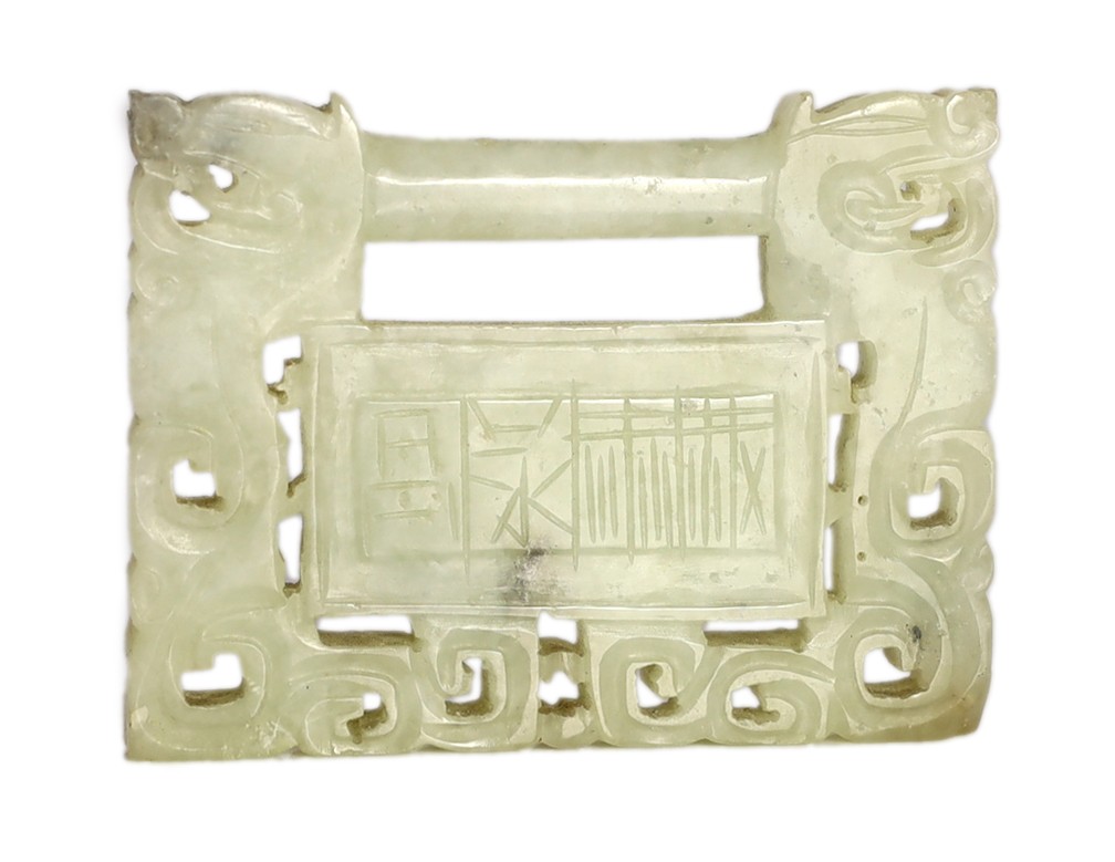 A Chinese speckled white jade ‘lock’ pendant plaque, 19th/20th century, one side carved with a