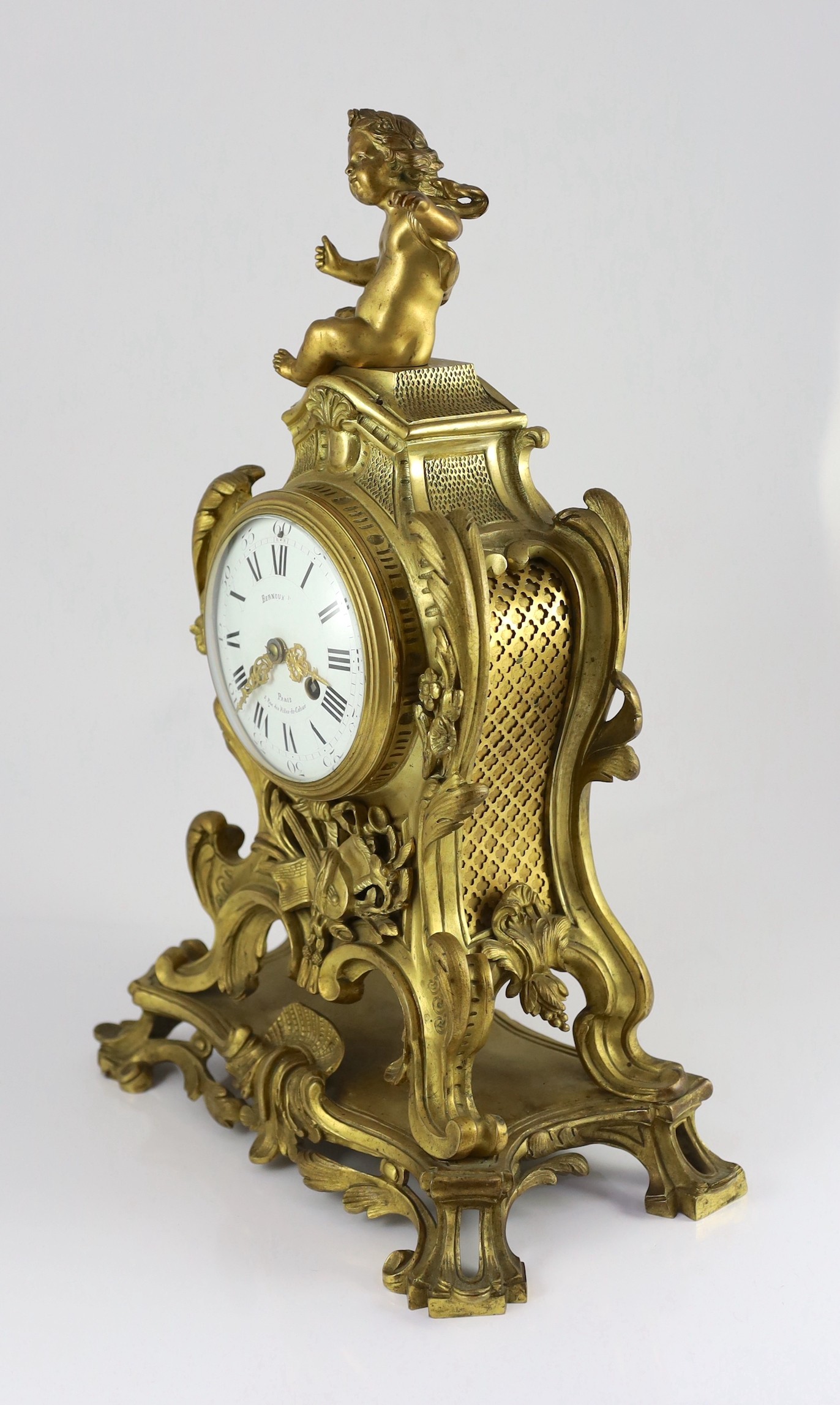 Bernoux of Paris. A 19th century Louis XV style ormolu mantel clock, with putto finial, enamelled - Image 4 of 6