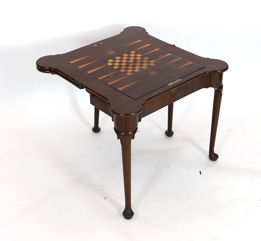 A George II mahogany games table, with eared triple folding top opening to reveal a baize surface - Image 3 of 6