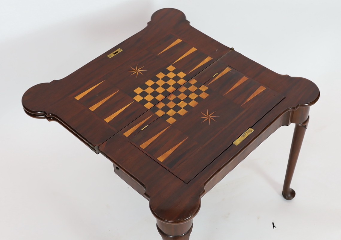 A George II mahogany games table, with eared triple folding top opening to reveal a baize surface - Image 4 of 6