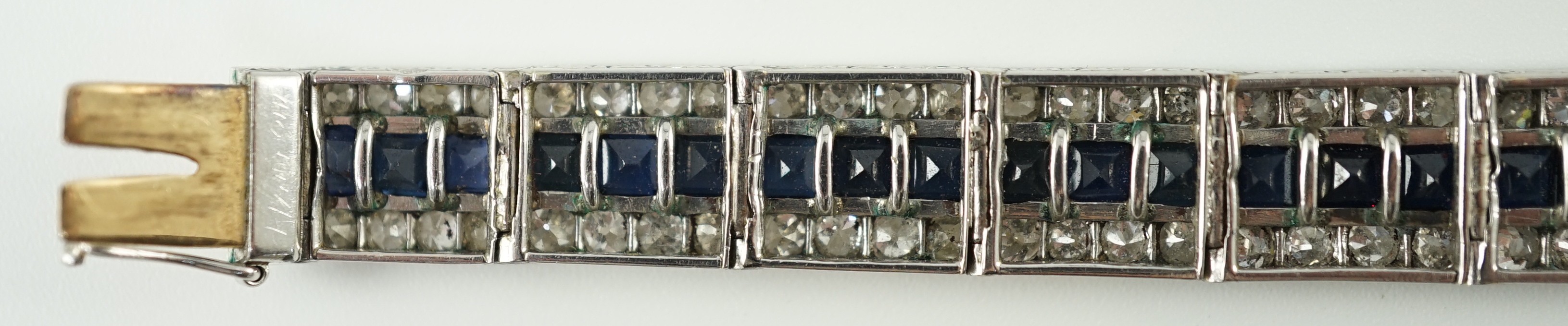 A 1920’s white gold, sapphire and diamond set triple line bracelet, with engraved setting and two - Image 9 of 9