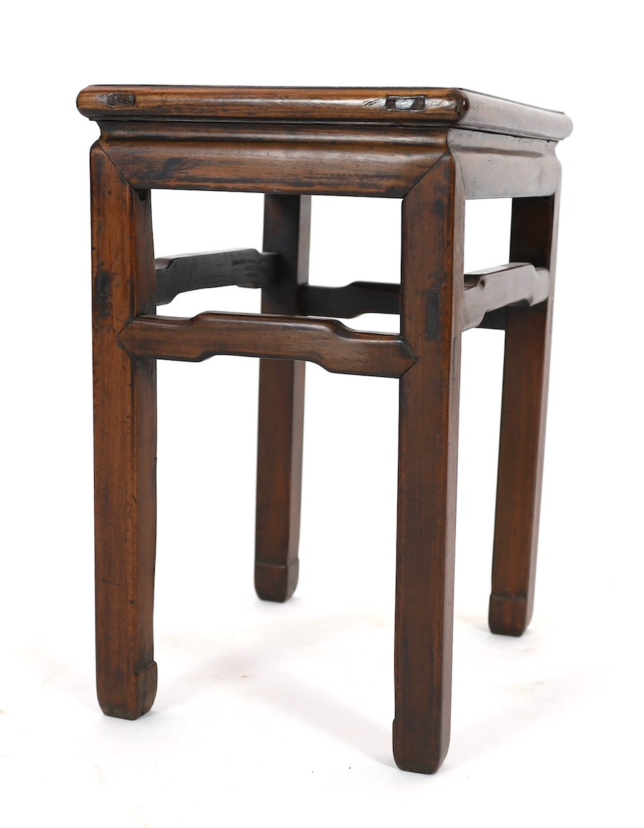 A Chinese huanghuali and hongmu stool, 18th/19th century, the panelled rectangular top above a - Image 4 of 4