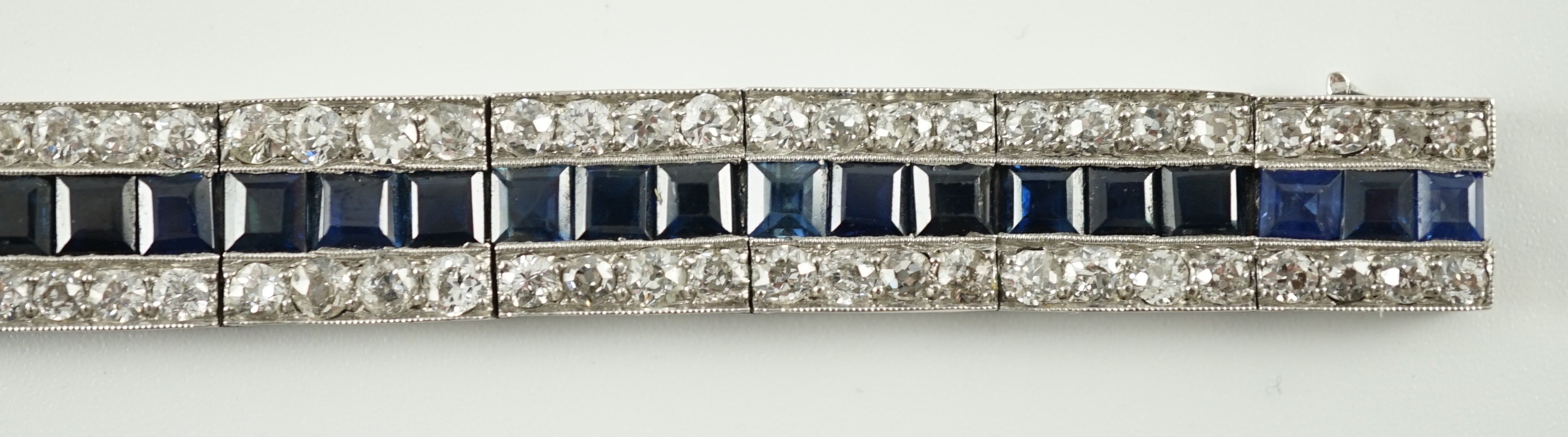 A 1920’s white gold, sapphire and diamond set triple line bracelet, with engraved setting and two - Image 6 of 9