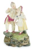 A Höchst porcelain group by Melchior, modelled as a boy and girl wearing fancy dress, c.1770, the