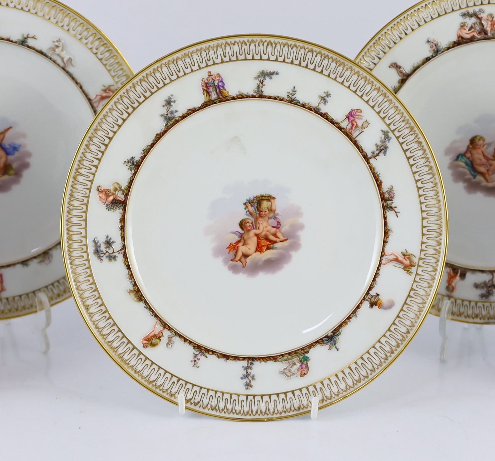 A set of five Meissen Capo di Monte style plates, 19th century, each painted to the centre with - Image 2 of 9
