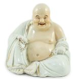A large Chinese porcelain seated figure of Budai, Republic period, holding a rosary of beads in