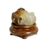 A Chinese two colour agate carving of a ram and a cat, 19th century, the carver skilfully using