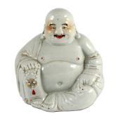 A Chinese porcelain figure of Budai, Republic period, holding a rosary in his right hand, his robe