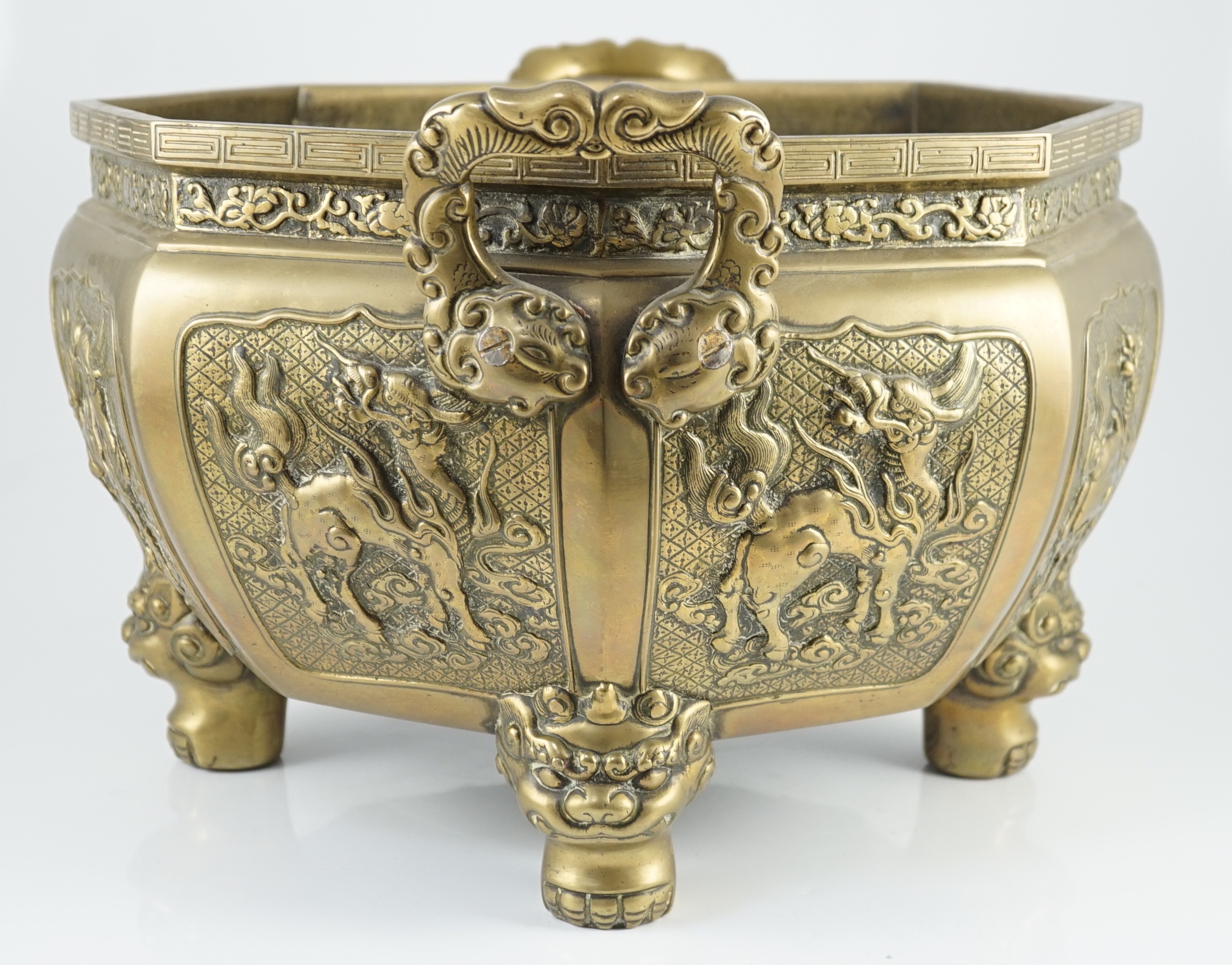 A large Chinese polished bronze octagonal jardiniere, 19th century, each side cast in relief with - Image 4 of 9