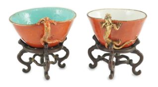 Two similar Chinese coral ground libation cups, late 18th/early 19th century, each of oval