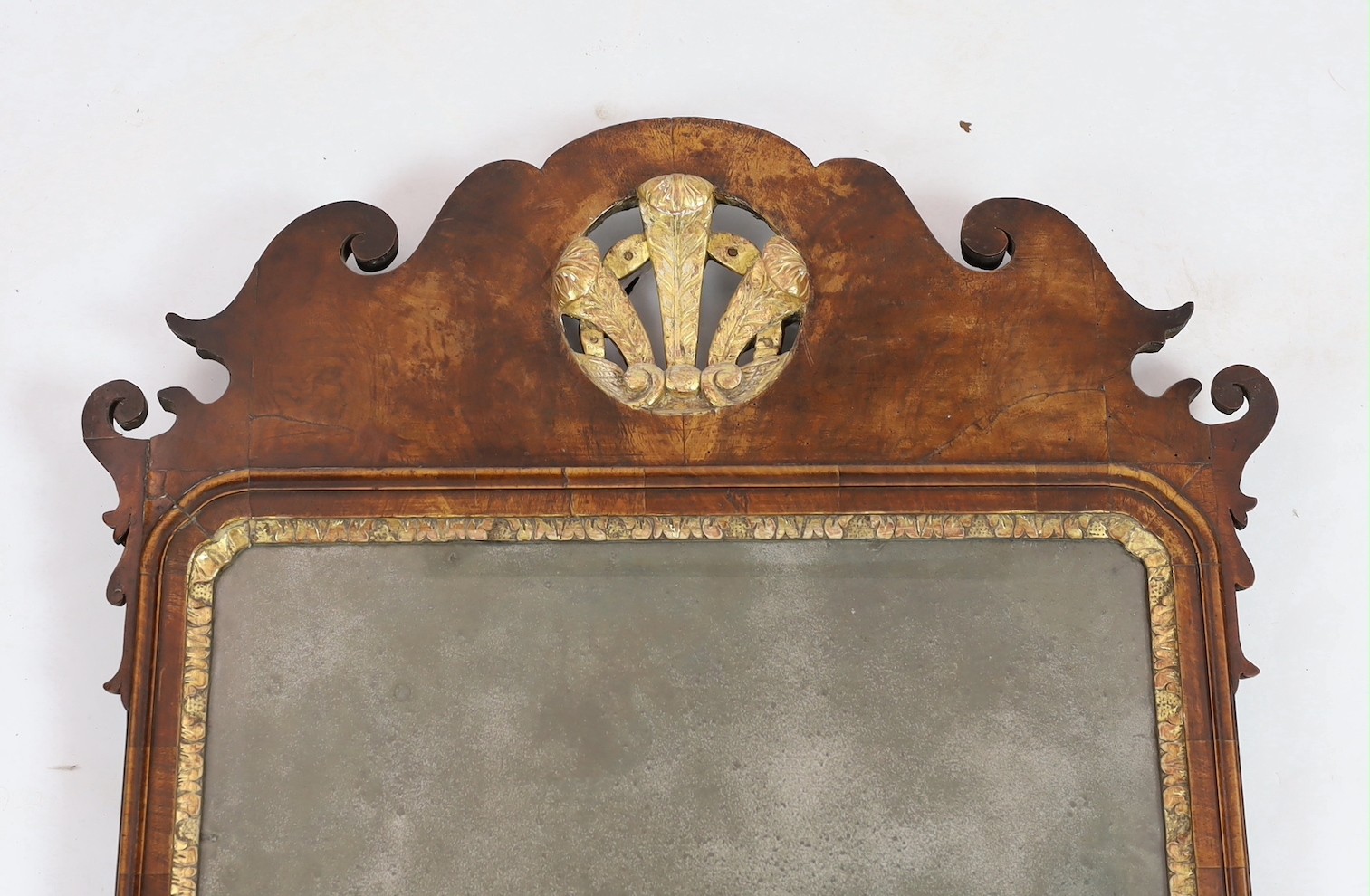 A George II walnut and parcel gilt fret frame wall mirror, with Prince of Wales feathered crest - Image 3 of 5