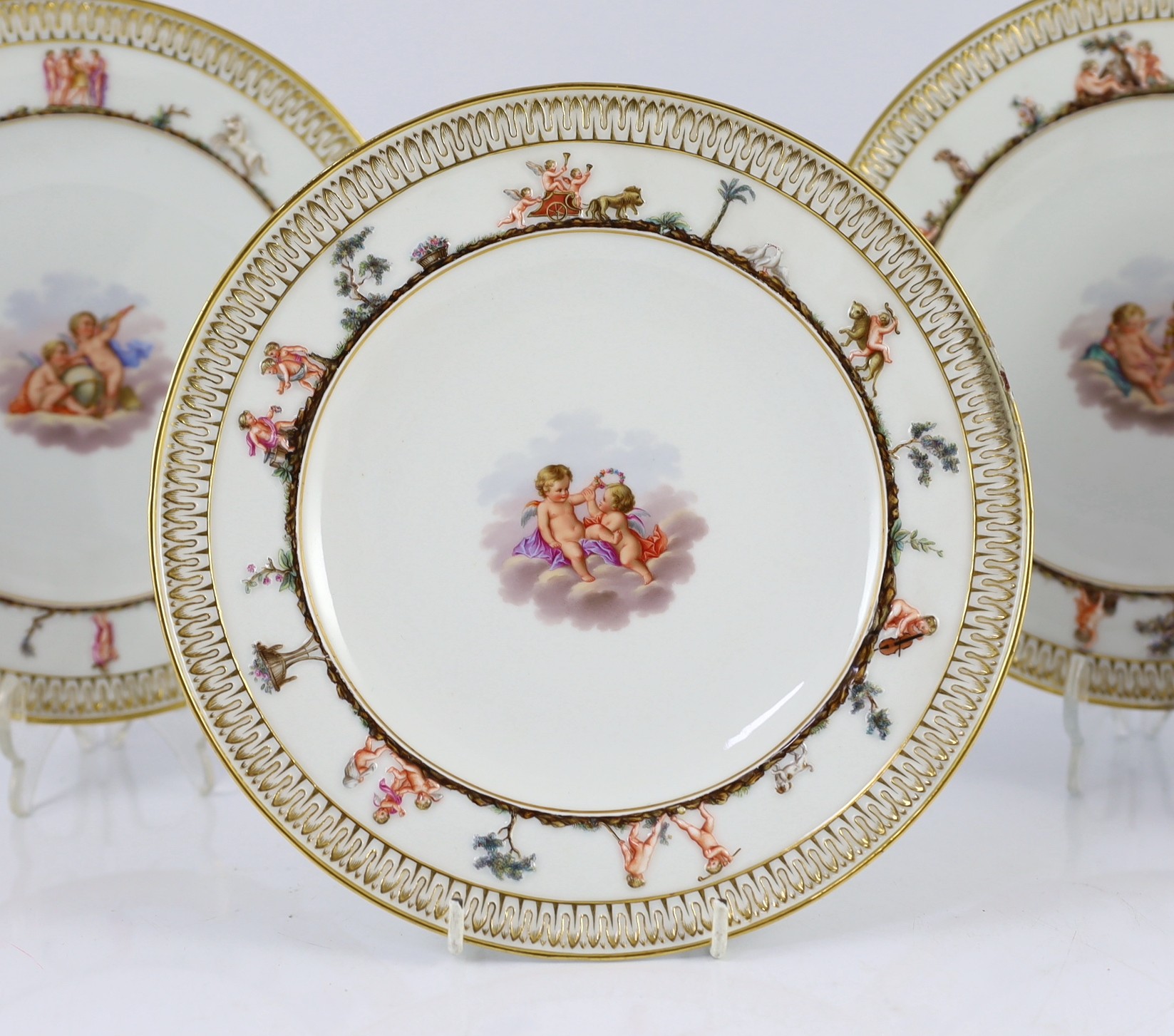 A set of five Meissen Capo di Monte style plates, 19th century, each painted to the centre with - Image 4 of 9