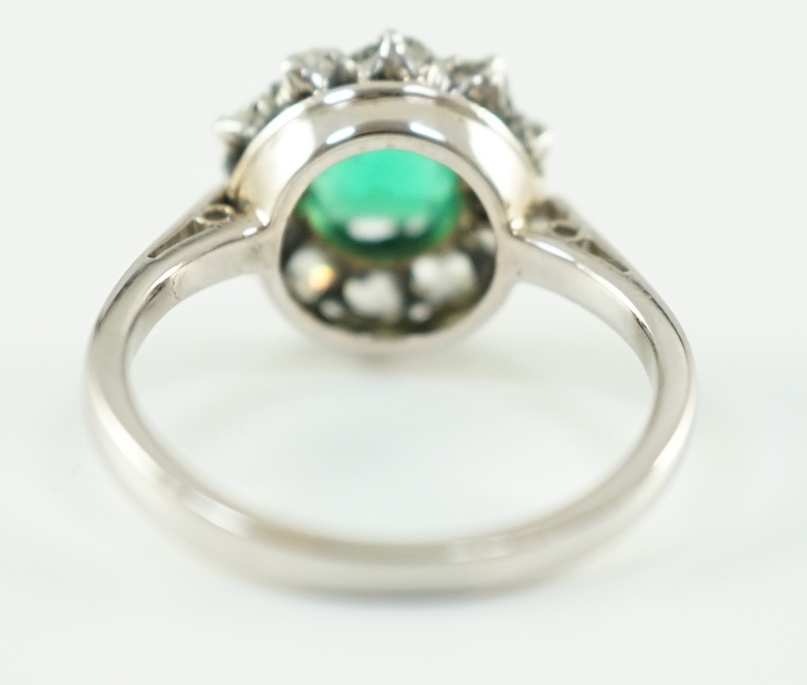 An early to mid 20th century, platinum, octagonal cut emerald and round cut diamond set circular - Image 6 of 6