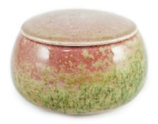 A Chinese peachbloom glazed weiqi stone box and cover, 20th century, 13.5cm diameter***CONDITION