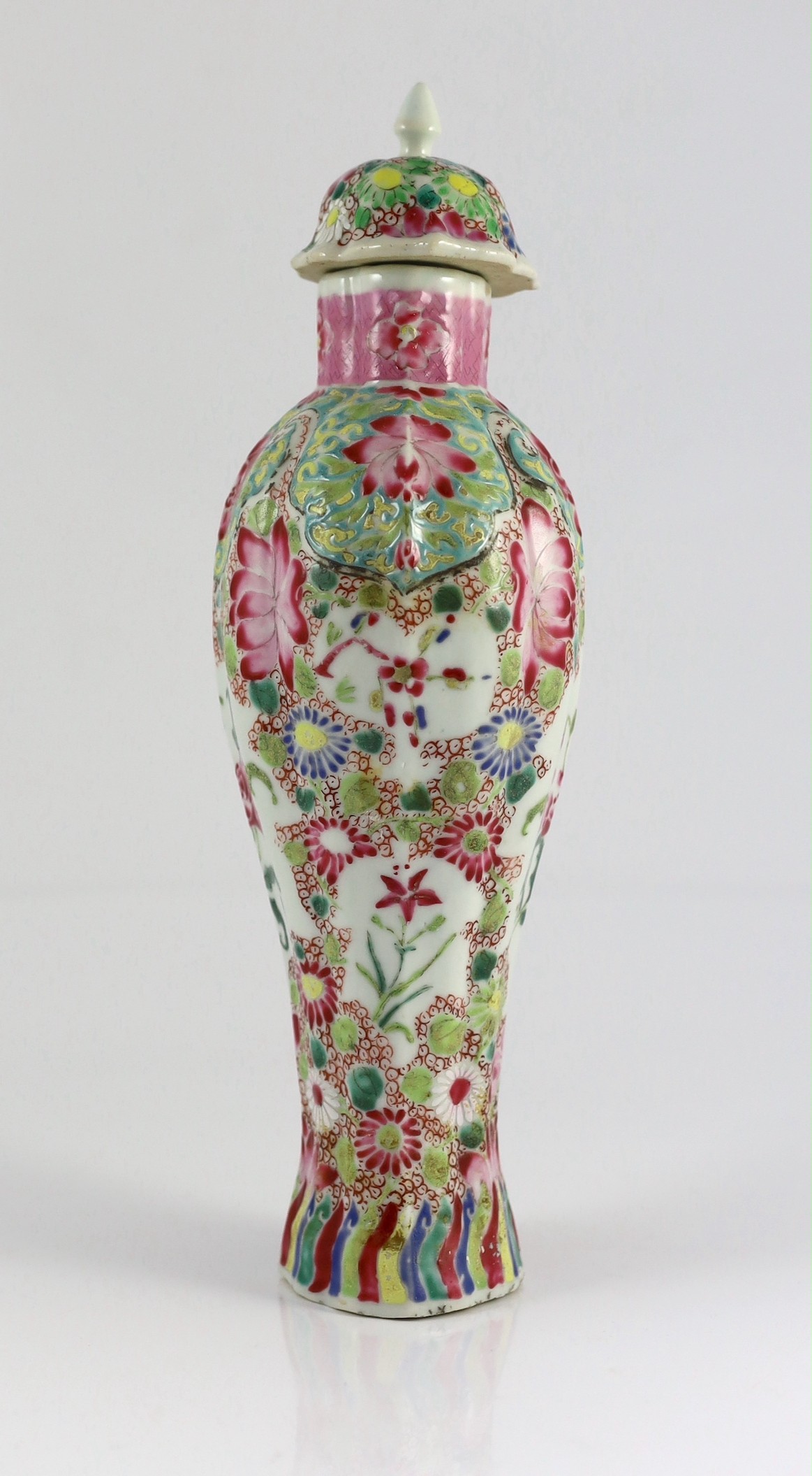 A Chinese famille rose moulded baluster vase, Qianlong period, painted with trailing flowers on a - Image 4 of 7