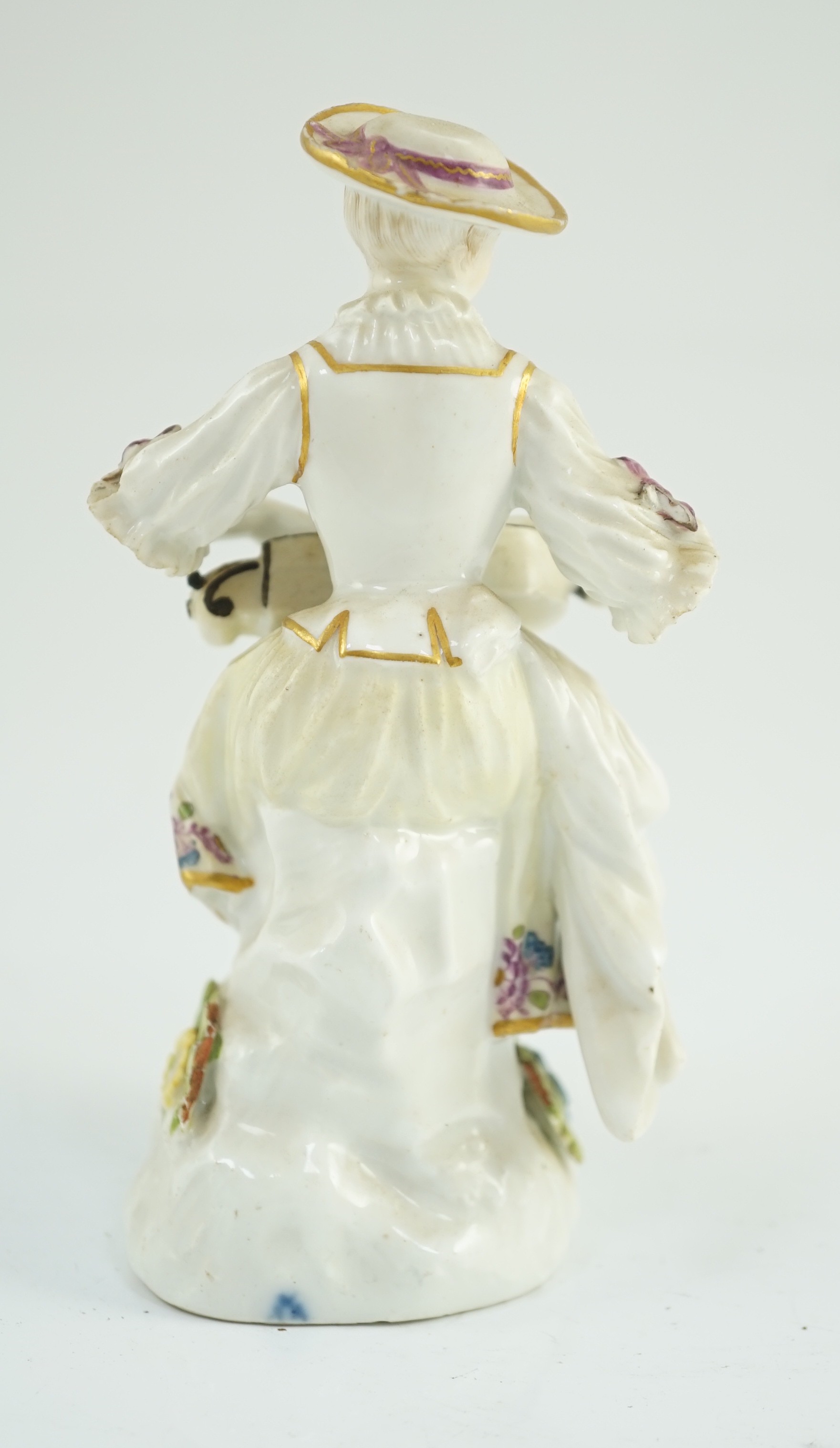 A Meissen porcelain figure of a woman playing the hurdy gurdy, mid 18th century, possibly modelled - Image 4 of 6