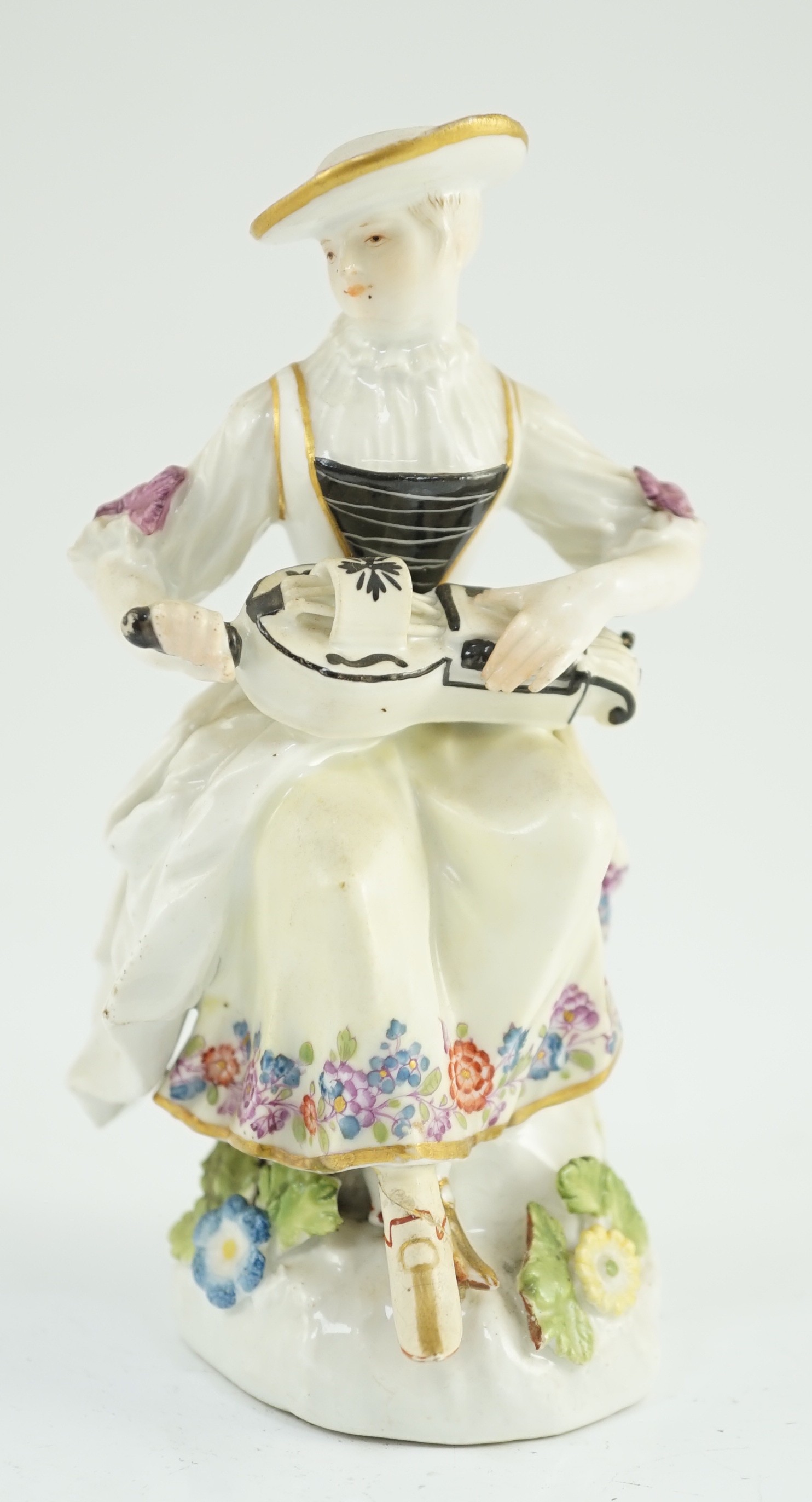 A Meissen porcelain figure of a woman playing the hurdy gurdy, mid 18th century, possibly modelled - Image 2 of 6