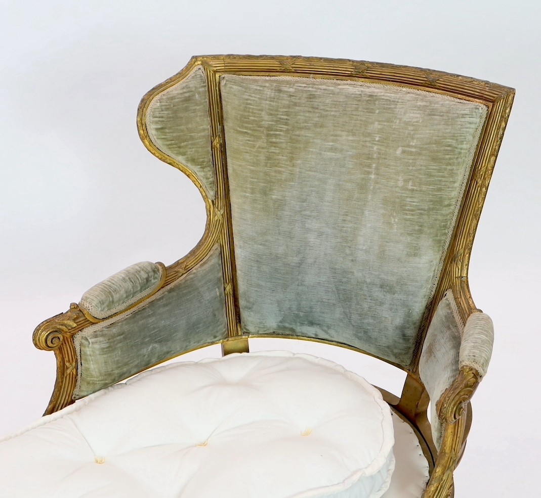 A 19th century Louis XVI style giltwood chaise longue, with reeded ribbon tied rails, acanthus - Image 2 of 6