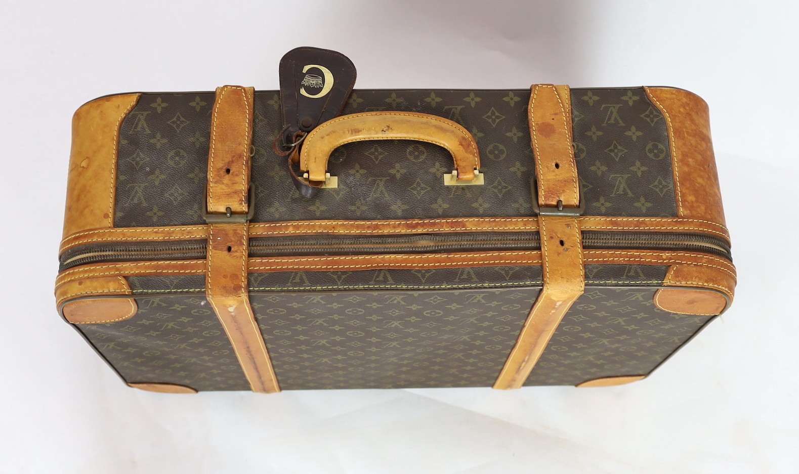 A 1980/90s Louis Vuitton canvas monogram suitcase, with calf leather straps and brass hardware, - Image 3 of 5