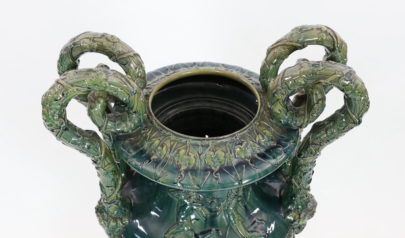 A massive Continental majolica green glazed campana vase and associated stand, late 19th century, - Image 5 of 6