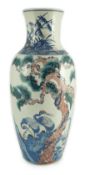 An unusual Chinese green enamelled underglaze blue and copper red tall vase, 19th century, finely