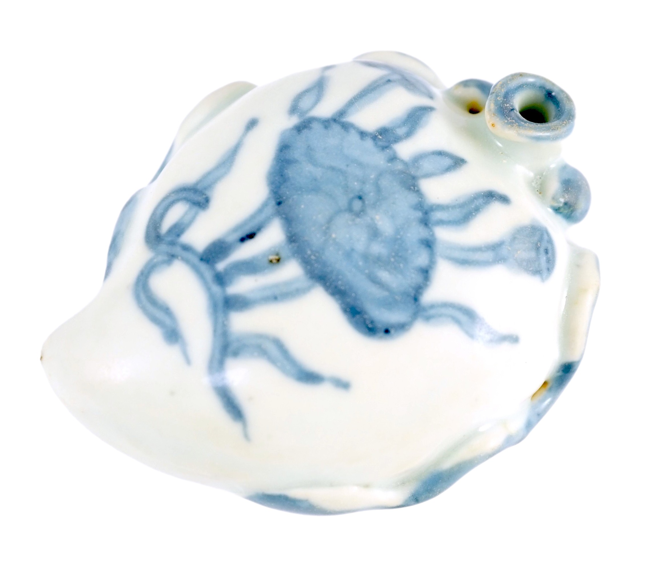 A Chinese Ming blue and white peach form waterdropper, applied with scrolling tendrils and a small