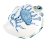 A Chinese Ming blue and white peach form waterdropper, applied with scrolling tendrils and a small