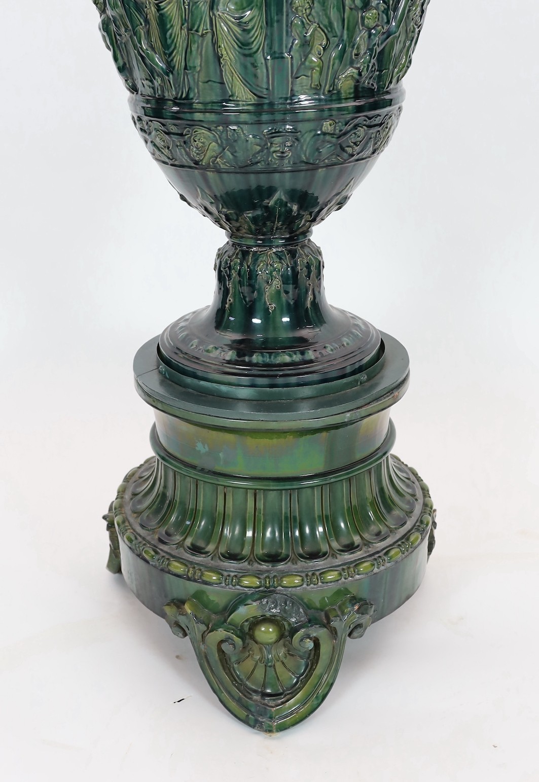 A massive Continental majolica green glazed campana vase and associated stand, late 19th century, - Image 3 of 6