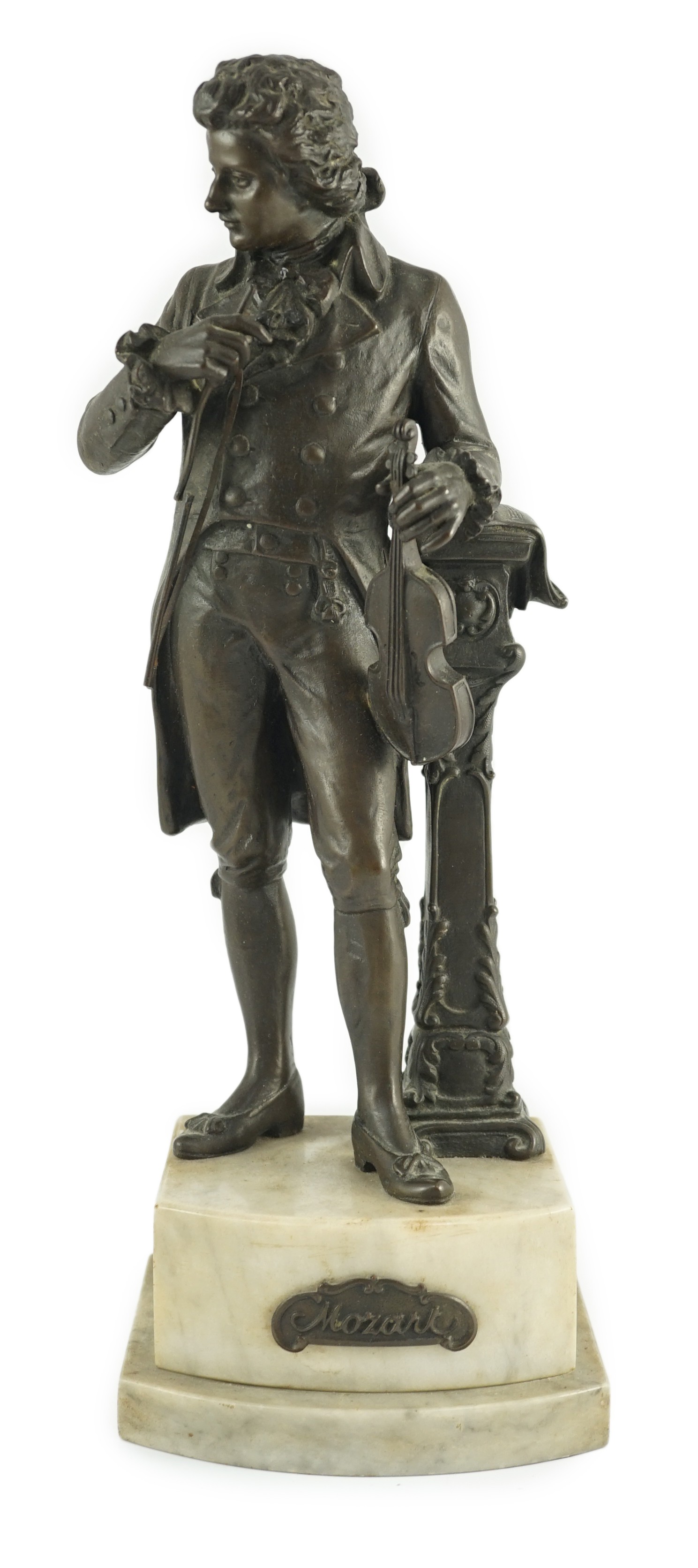 Carl Brose (German, 1880-). An early 20th century bronze figure of Mozart holding a violin, signed