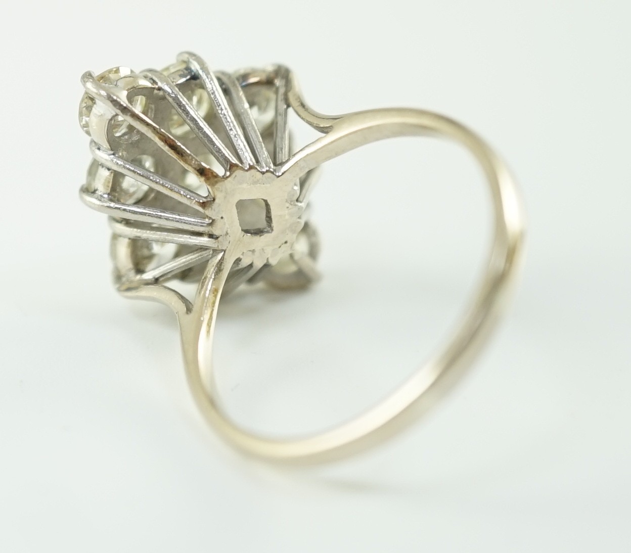 An 18ct white gold and nine stone diamond cluster set marquise shaped diamond ring, with a raised - Image 3 of 4