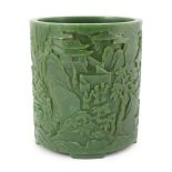 A large Chinese spinach green jade brushpot, bitong, carved in relief with scholars amid