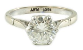 An 18ct white gold, platinum and solitaire diamond set ring, size M, gross weight 3.3 grams, the