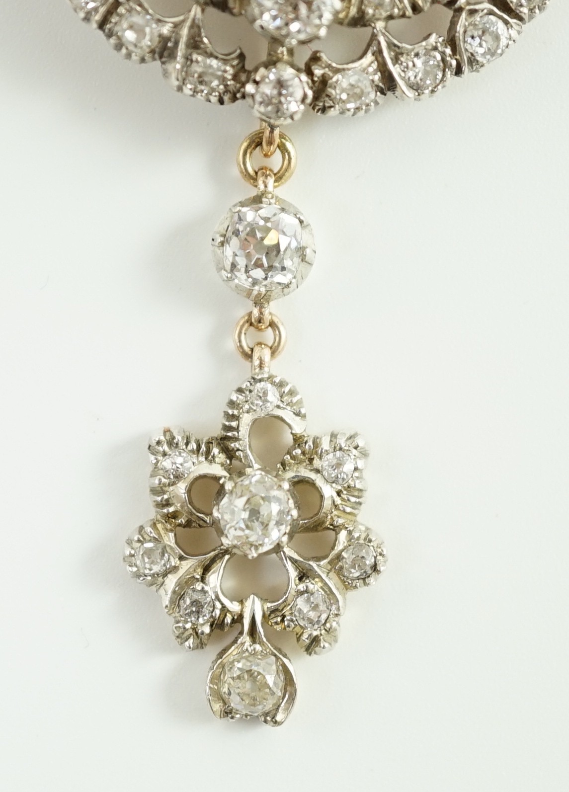 A Victorian gold, silver and graduated diamond cluster set target drop pendant brooch, retailed by - Image 4 of 8