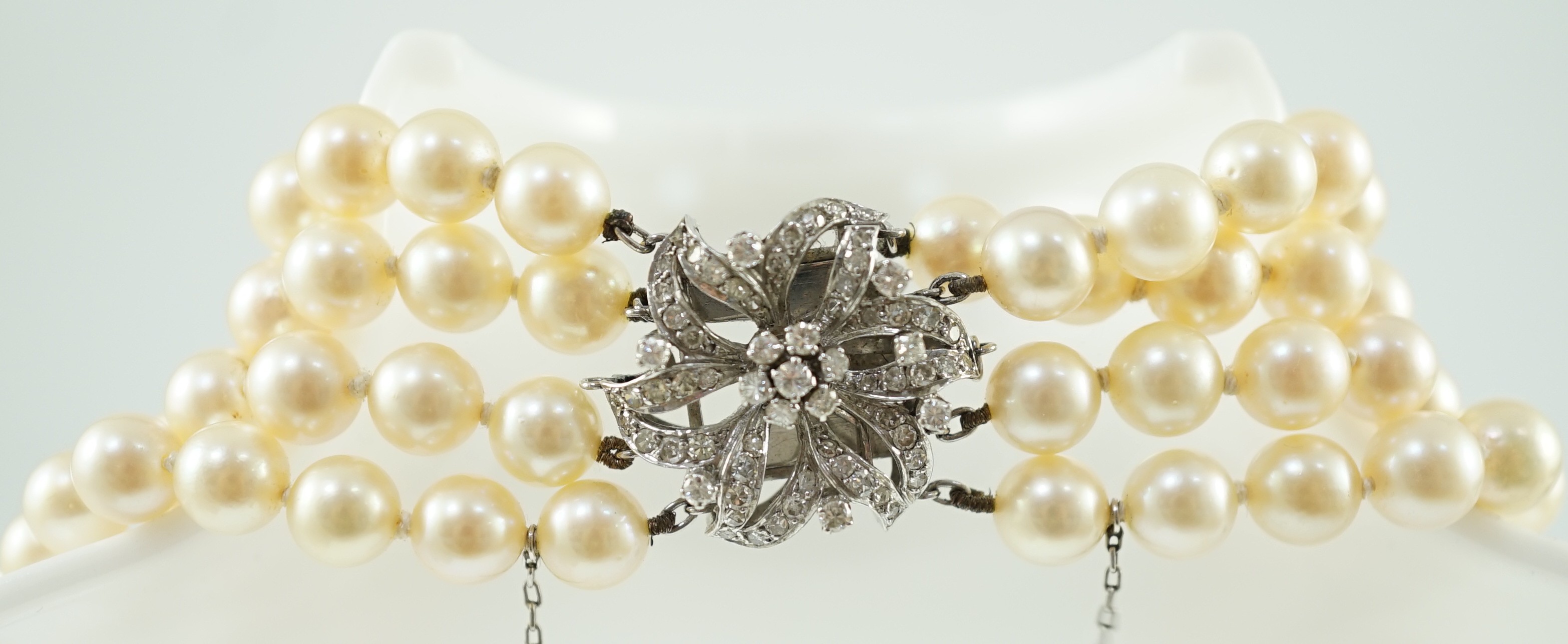 A mid to late 20th century continental quadruple strand cultured pearl necklace, with white gold and - Image 2 of 7