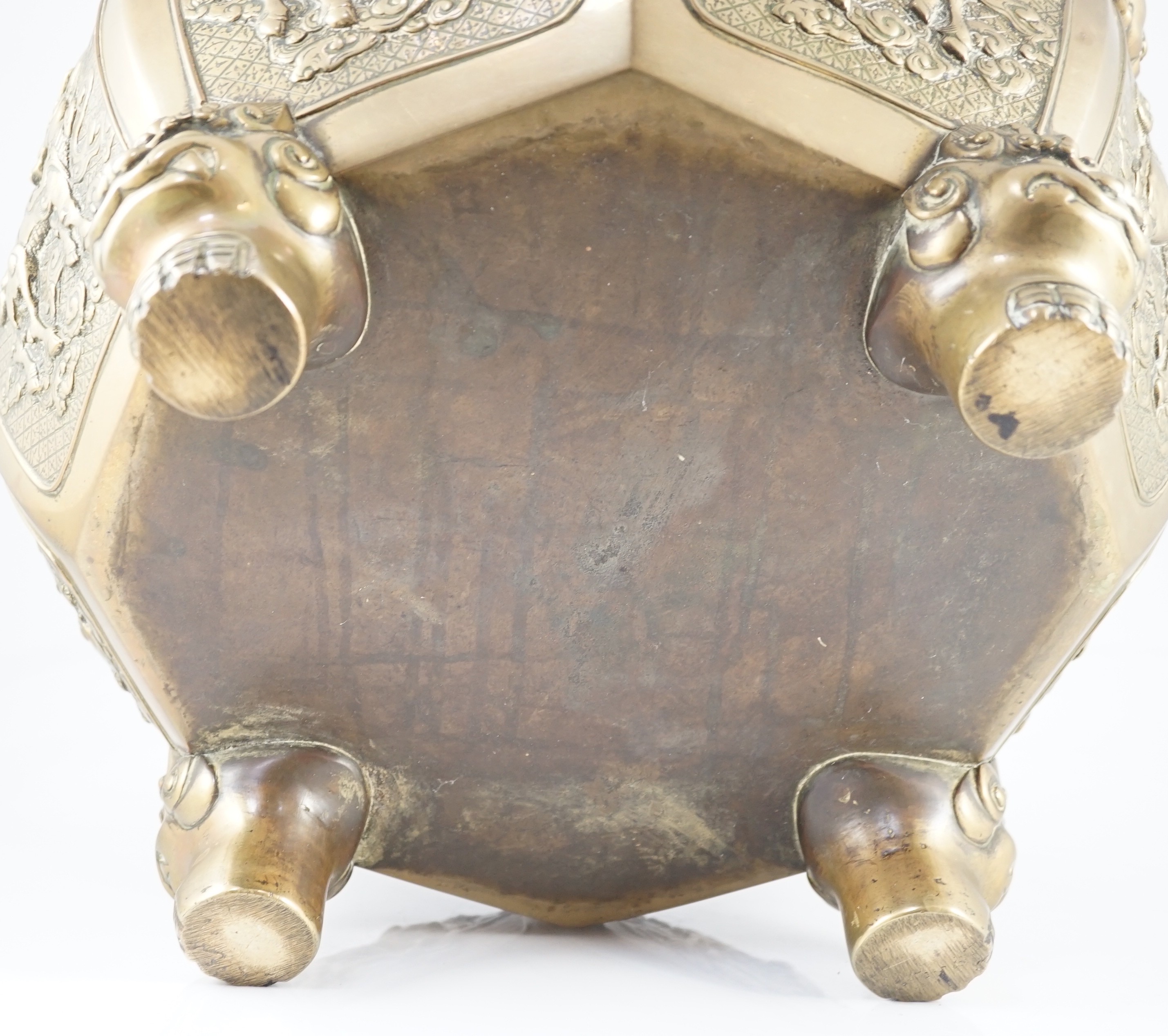 A large Chinese polished bronze octagonal jardiniere, 19th century, each side cast in relief with - Image 8 of 9