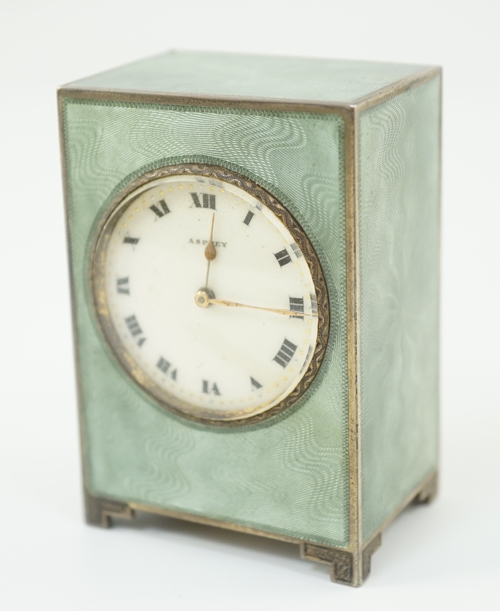 A George V silver and green guilloche enamelled travelling timepiece, retailed by Asprey, in - Image 3 of 11