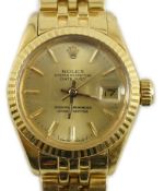 A lady's early 1980's 18ct gold Rolex Oyster Perpetual Datejust wrist watch, on 18ct gold Rolex