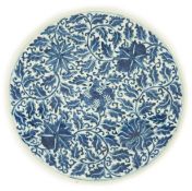 A Chinese blue and white dish, Kangxi mark, 19th century, the centre painted with four