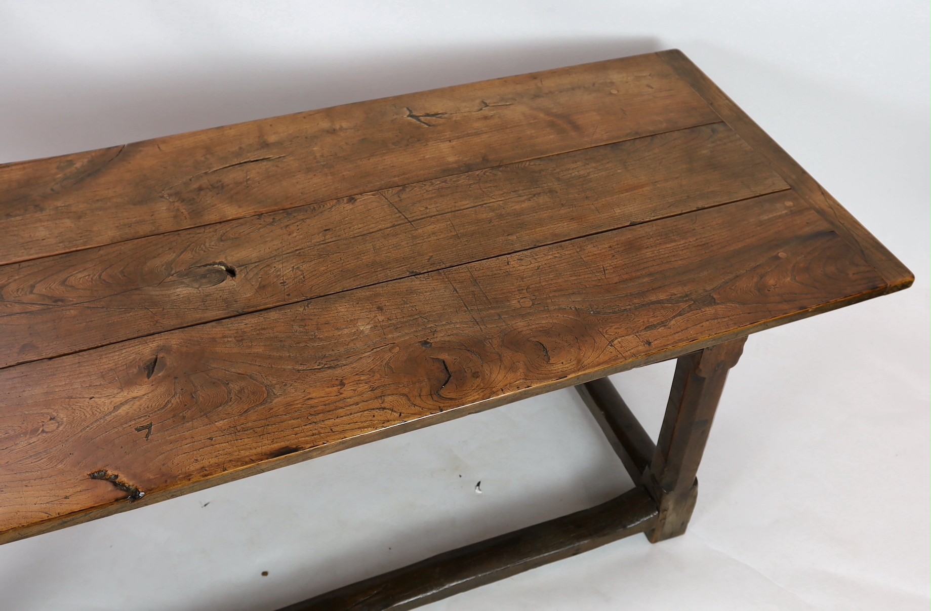A late 17th / 18th century oak and elm refectory table, with triple planked top, on octagonal legs - Image 3 of 4