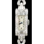 A lady's 1930's/1940's platinum, baguette and round cut diamond set rectangular dial manual wind