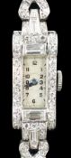A lady's 1930's/1940's platinum, baguette and round cut diamond set rectangular dial manual wind