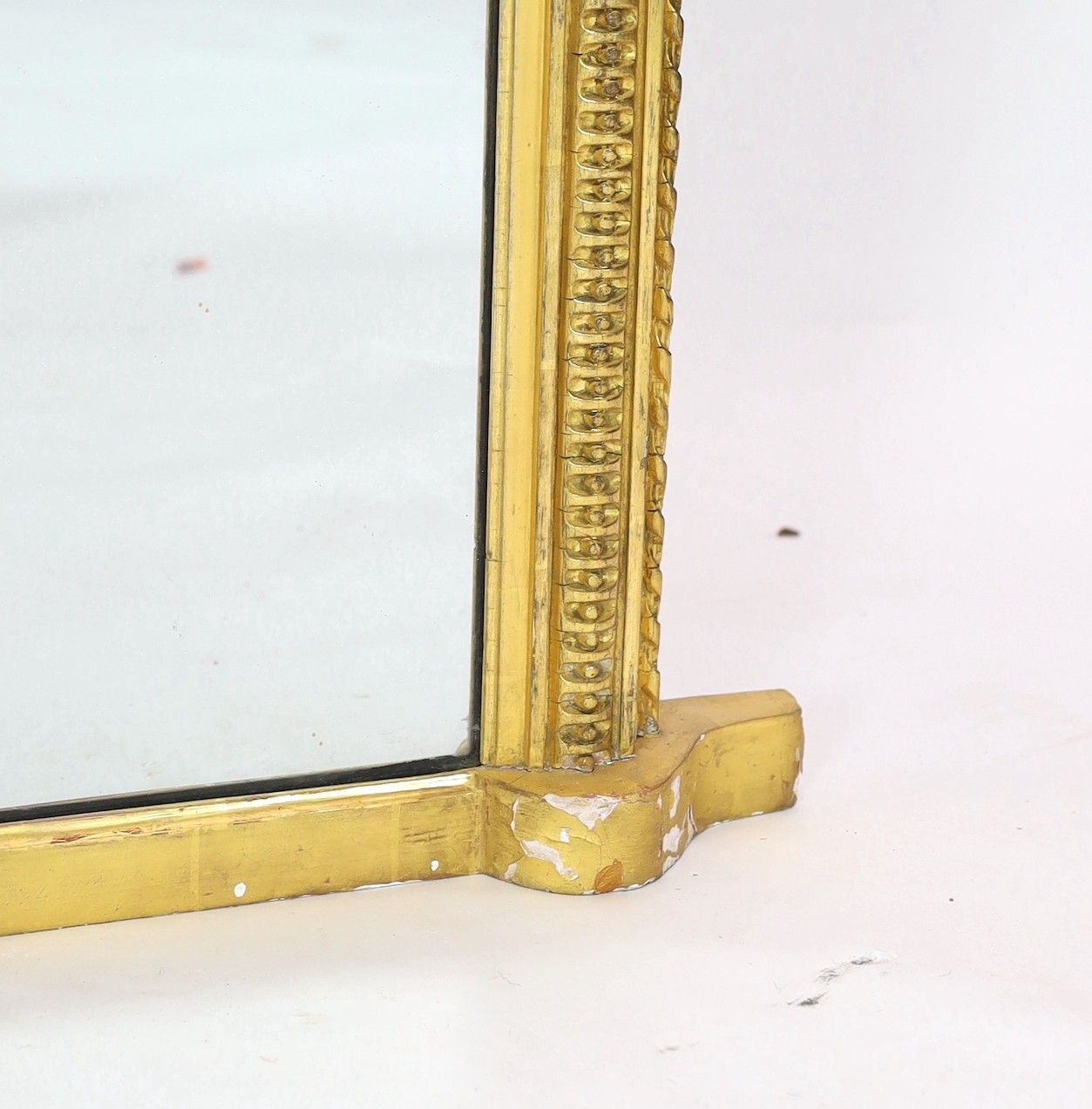 A Victorian giltwood and gesso overmantel mirror, of arched form with foliate scroll crest and - Image 4 of 5