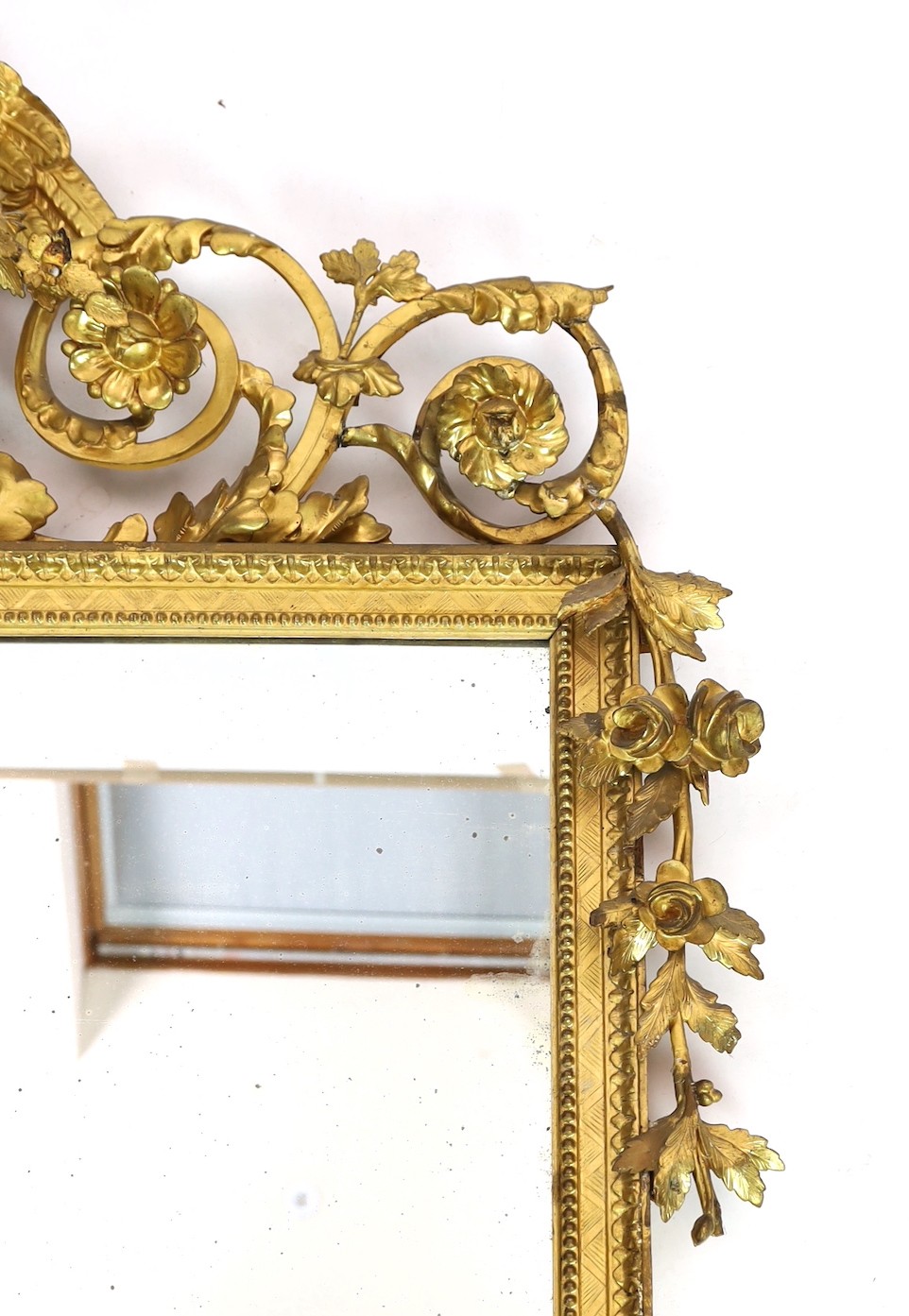 A 19th century century carved giltwood wall mirror, with elaborate ornate eagle and flowering swag - Image 4 of 4