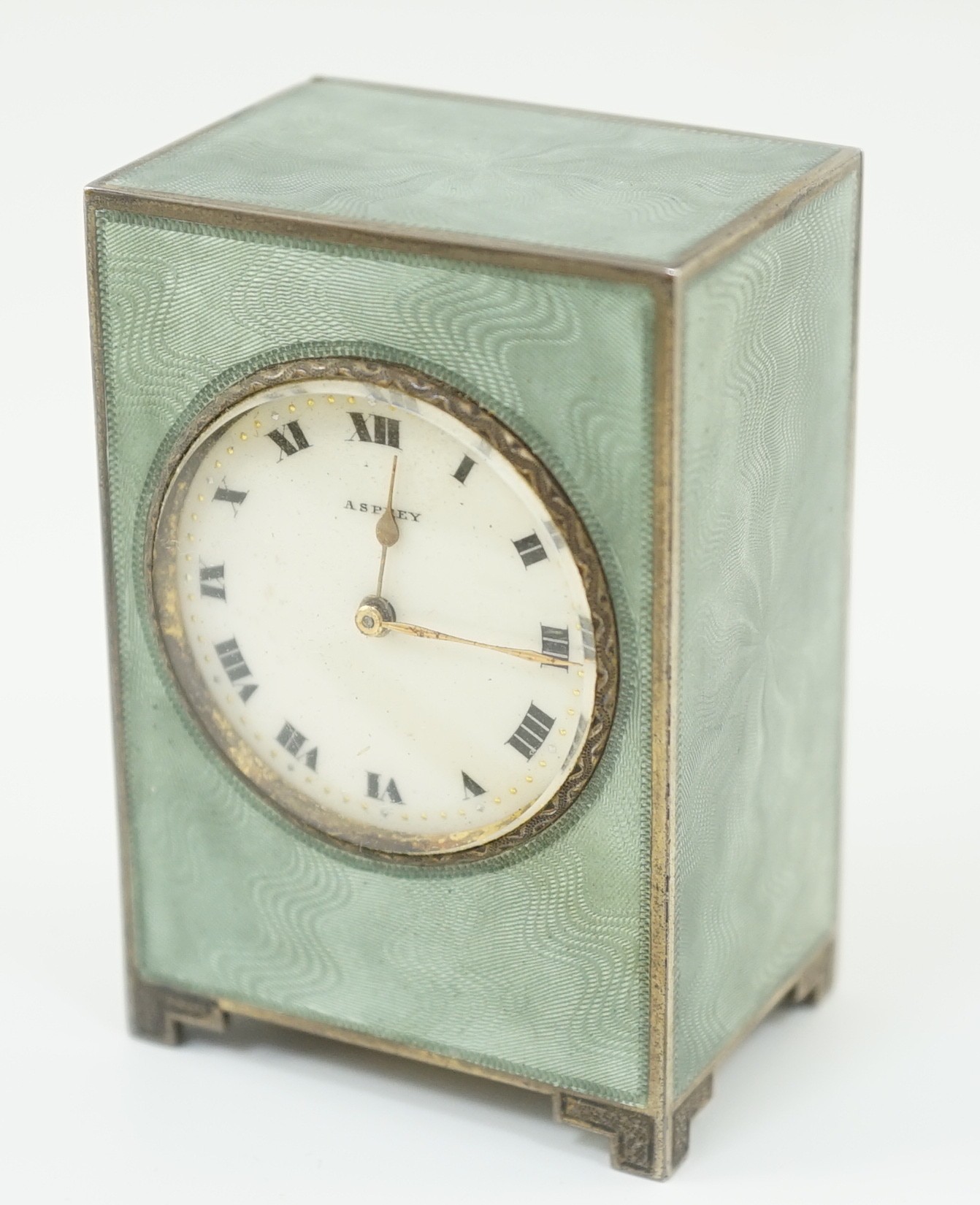A George V silver and green guilloche enamelled travelling timepiece, retailed by Asprey, in - Image 5 of 11