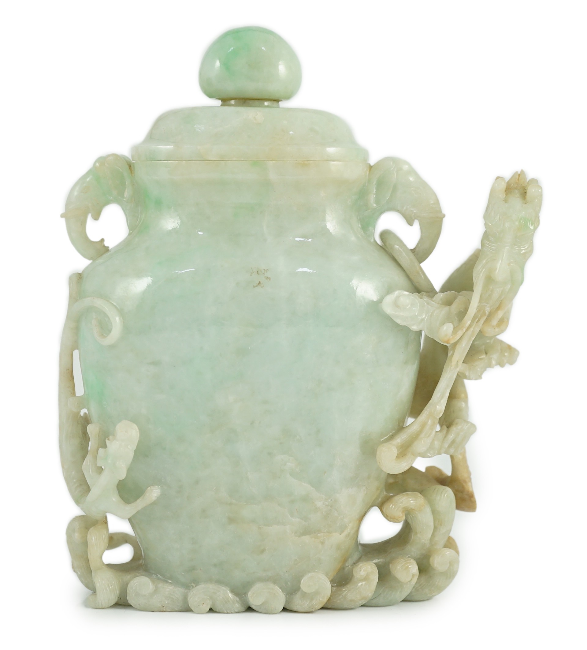 A Chinese jadeite 'dragon' vase and cover, late 19th/early 20th century, carved in high relief and