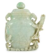 A Chinese jadeite 'dragon' vase and cover, late 19th/early 20th century, carved in high relief and