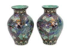 A pair of massive Japanese Kutani porcelain vases, Meiji period, influenced by de Morgan designs,