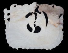 A Chinese late Ming white and grey jade ‘dragon-fish’ plaque, 17th century, carved in relief and