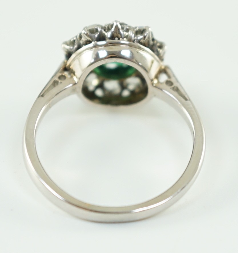 An early to mid 20th century, platinum, octagonal cut emerald and round cut diamond set circular - Image 5 of 6