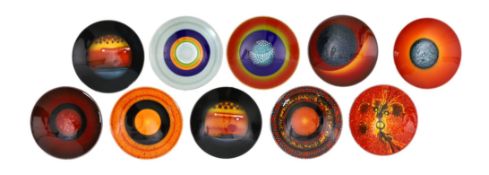 Alan Clarke for Poole Pottery. A set of nine ‘Alignment of the Planets’ chargers and one